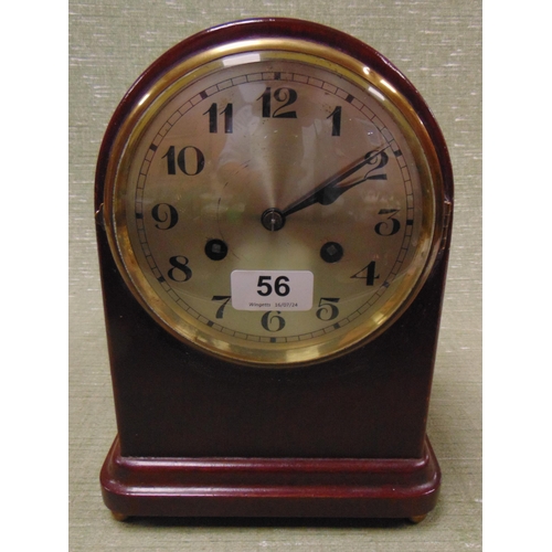 56 - Dome topped mantle clock, having silvered dial and Arabic numerals, 11