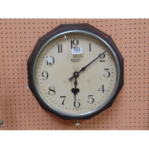 103 - Smith electric wall clock, contained in a bakelite case.