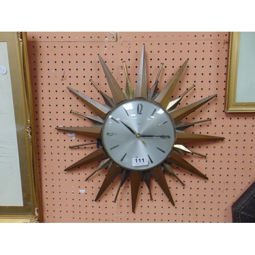 111 - Metamec starburst wall clock, 17