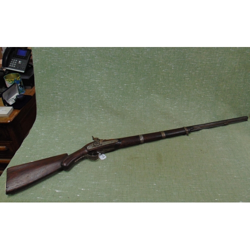 115 - An antique musket.