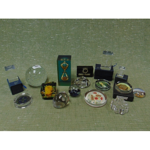 90 - Quantity of glass paperweights.