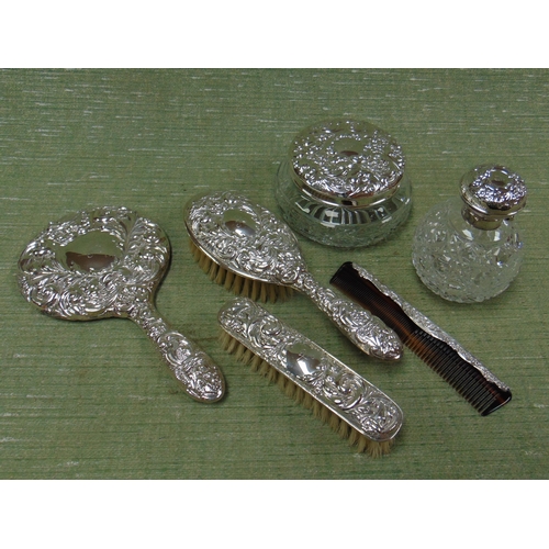 81 - Matched silver backed six piece dressing table set.