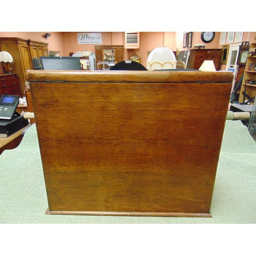 66 - Antique oak writing slope, the top having perpetual calendar, tambour front with pull out leather su... 