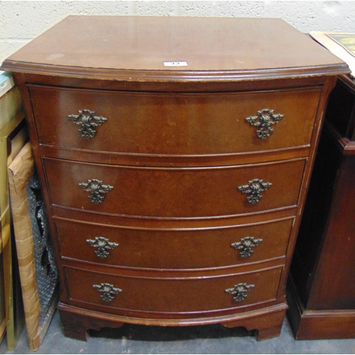 33 - Reproduction bow fronted dwarf chest of four long drawers with metal handles and on bracket feet, 24... 