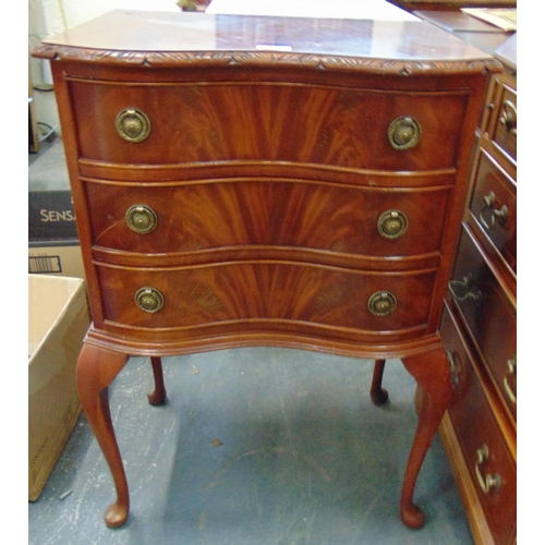 49 - Antique style serpentine form chest of three drawers with ring handles and on cabriole supports, 31 ... 