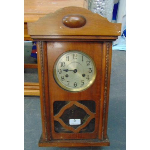 9 - Mahogany cased wall clock, having silvered dial and Arabic numerals, 20 x 10 x 5.5