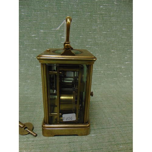 176 - Magray & Chisholm Paris  brass cased carriage clock, having enamel face and Roman numerals, 5