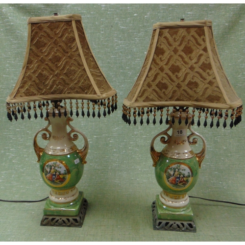 18 - Pair of ornate pottery table lamps, having gilt side handles and classical scene decoration, each 15... 