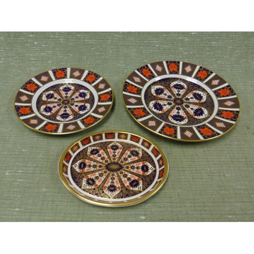 27 - Royal Crown Derby old Imari pattern oval dish and two plates.