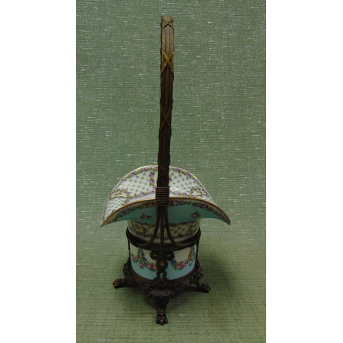 41 - Continental floral decorated hat form vase, set on a gilt metal stand, 17.5