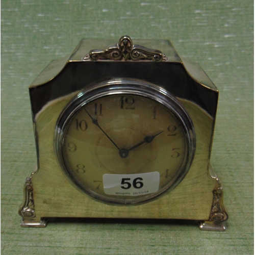 56 - Antique French mantle clock, contained in a plated case, 6