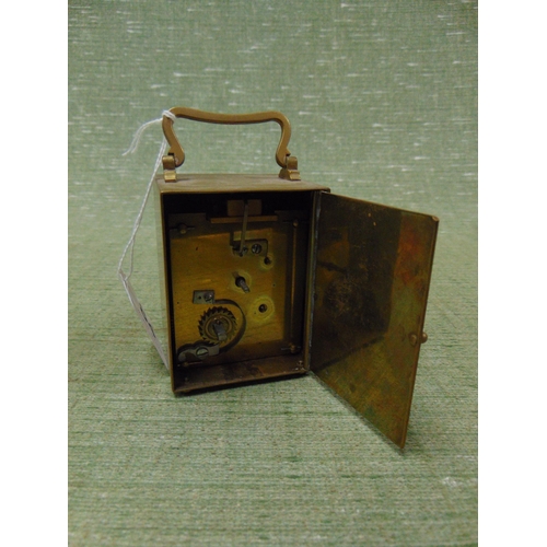 84 - Miniature brass cased carriage clock, having enamel face and  Roman numerals, 3