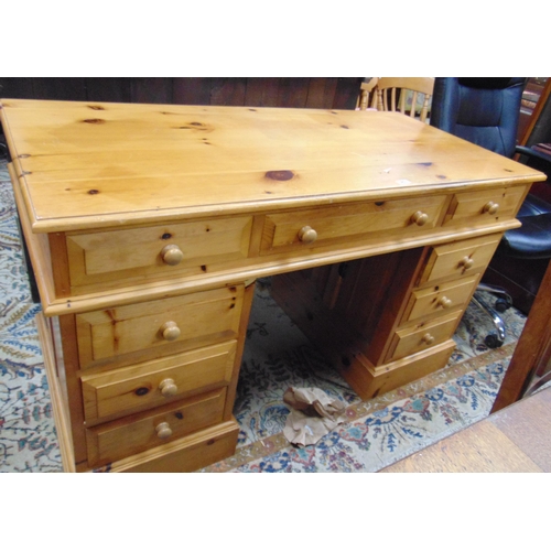 339 - Pine pedestal desk and a swivel office chair.