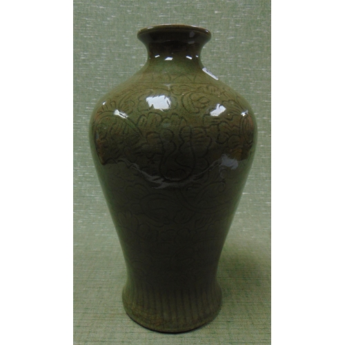 101 - Celadon vase, having foliate decoration, 14.5