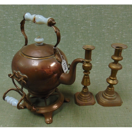 114 - Copper spirit kettle on stand, together with a pair of brass candlesticks.