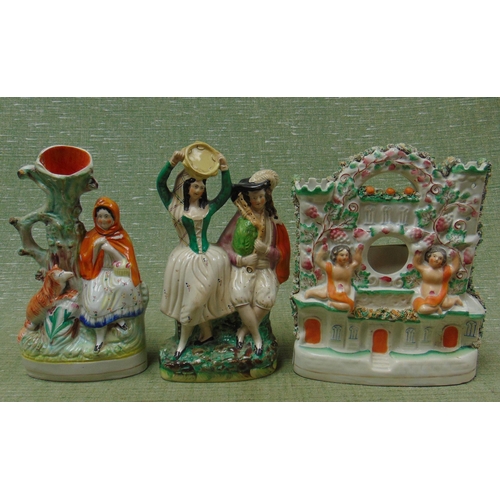 117 - Three antique Staffordshire figures.