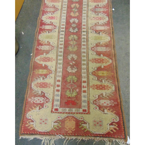 2 - Red and yellow ground Persian runner, having geometric pattern, 105 x28