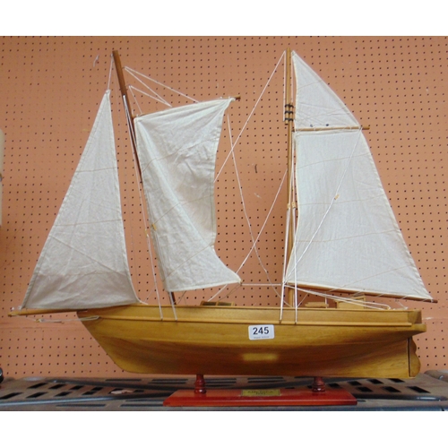 245 - Model sailing vessel on stand, 'America'.