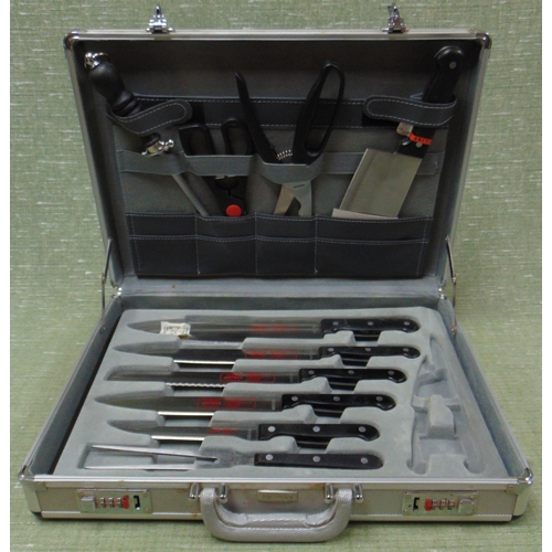 308 - Cased set of Solingen chef's knives.