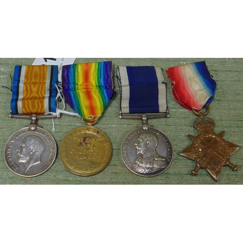 315 - Two First World War medals, M24764 AG PATSON AR CR RN, and a long service medal.