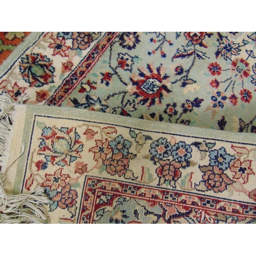 360 - Green and red ground runner, having geometric floral pattern decoration, 150 x 30