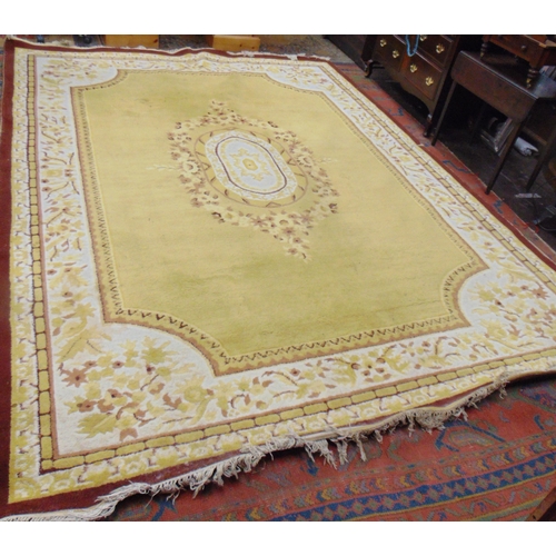 363 - Yellow and brown ground rug, having geometric pattern, 145 x 109