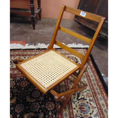 369 - Edwardian cane seated folding child's chair.