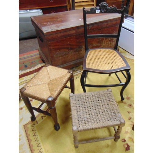 378 - Ebony bedroom chair, rush seated stool, and one other stool. (3)