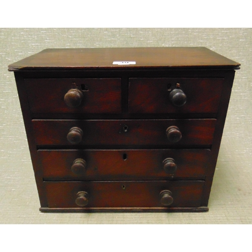 39 - Antique mahogany table top chest of two short and three long drawers with knob handles, 13 x 15 x 8.... 