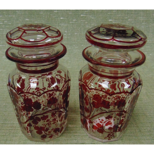 394 - Pair of antique lidded jars, having red coloured floral decoration, each 6