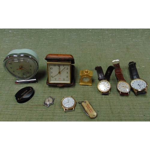 398 - Various watches and clocks.