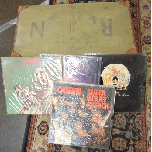 406 - Collection of Queen vinyl LP's contained in a vintage suitcase.