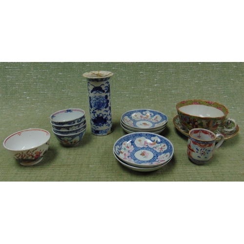 427 - An Oriental blue and white vase, tea bowls, etc.