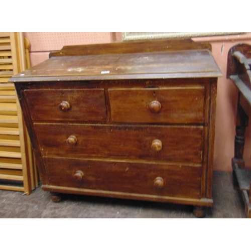 431 - Stained pine chest, raised back over two short and two long drawers, knob handles and on turned supp... 