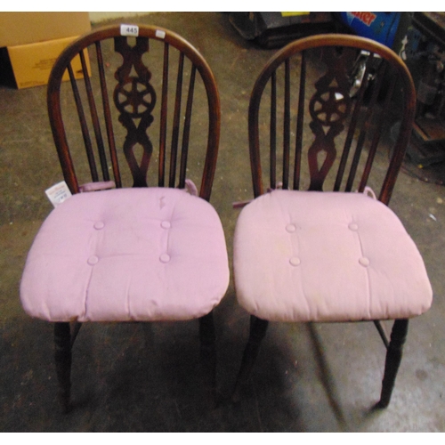 445 - Pair of elm wheel back chairs.