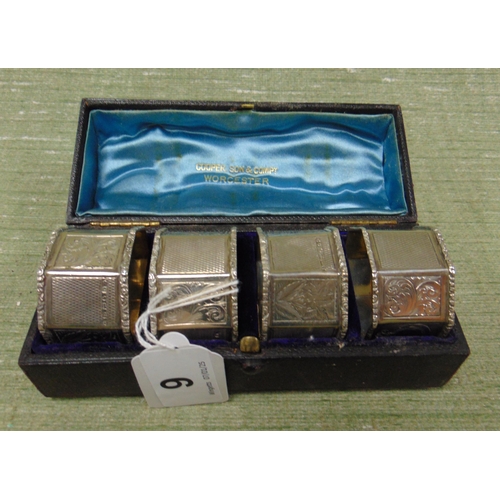 9 - Cased set of four silver napkin holders, maker George Unite, Birmingham 1870.