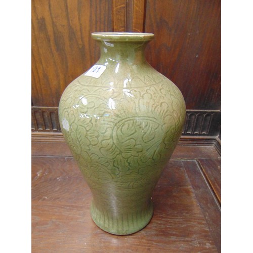 101 - Celadon vase, having foliate decoration, 14.5