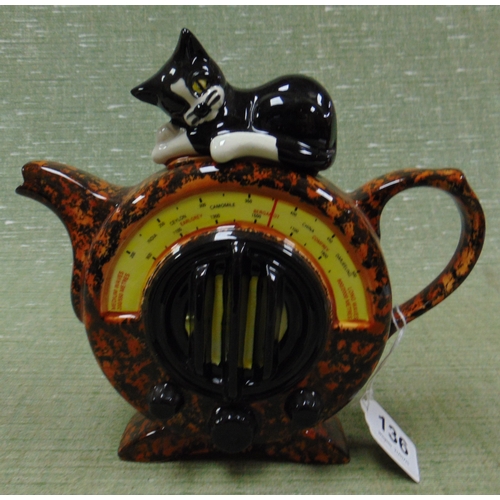 136 - Swineside ceramics, novelty teapot, in the form a vintage radio with a cat sat atop it.