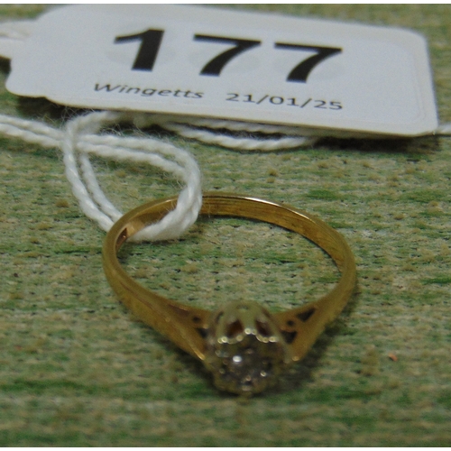 177 - 9ct gold ring, set with a clear central stone, size M.