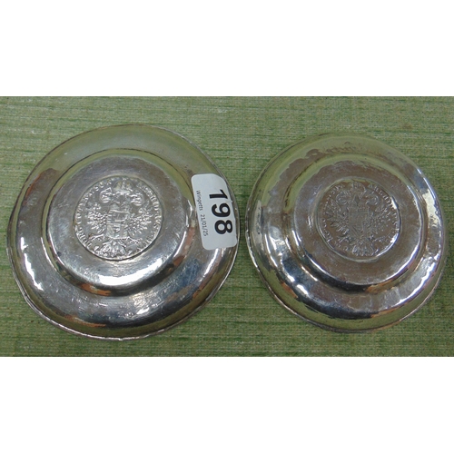 198 - Two bowls, inset with 1790 Maria Theresia coins.