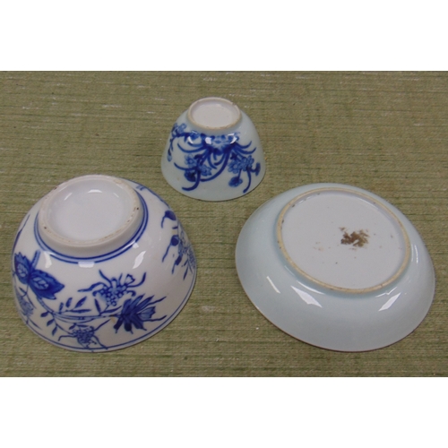 207 - An oriental tea bowl, saucer and one other bowl.