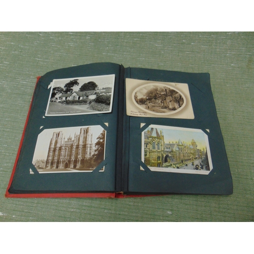 23 - Postcard album and contents.