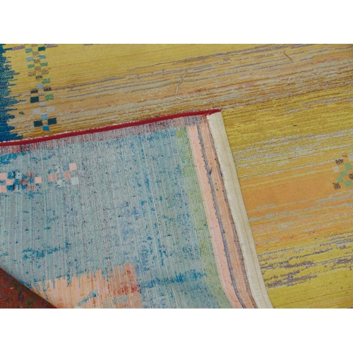 314 - Modern multi coloured rug.