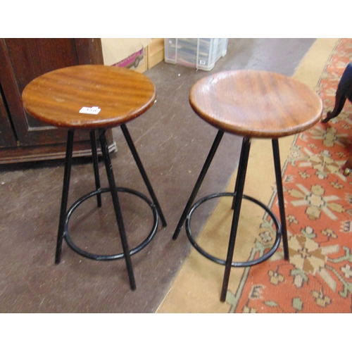 358 - Industriania, pair of factory stools, each 22