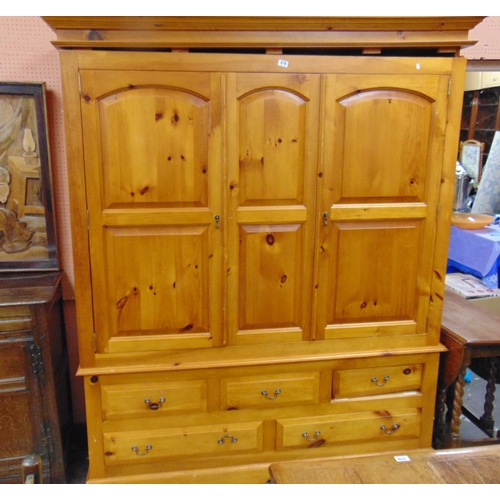 379 - Modern pine triple door wardrobe.