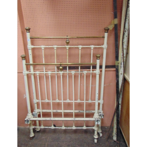 382 - 19th century painted cast iron and brass single bedstead.