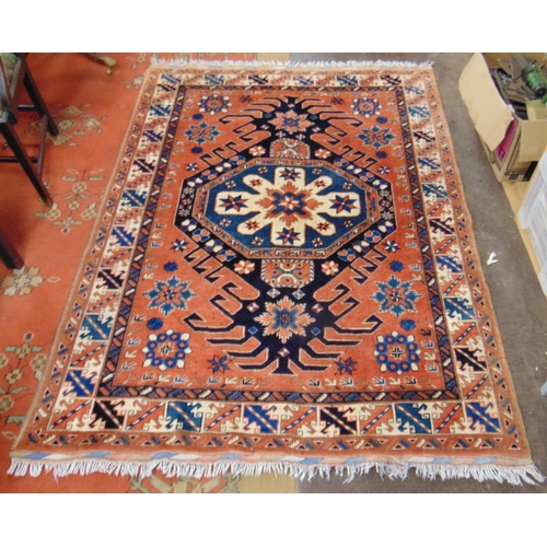 391 - Pink and blue ground Pakistani region rug, having geometric pattern, 83 x 60