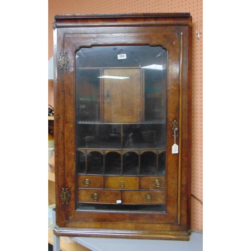 393 - Good antique walnut corner cupboard, ogive cornice above single glazed door enclosing drawers and pi... 