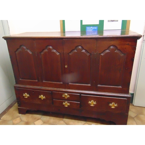 394 - Antique Welsh oak cupboard, rectangular top over quadruple panel front, pair of centre doors, over t... 