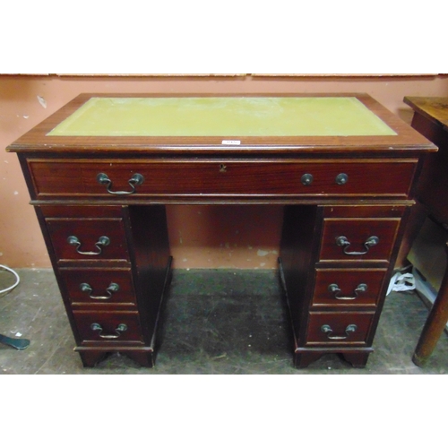 395 - Small reproduction pedestal desk, inset leather top, single long drawer with three drawers to either... 